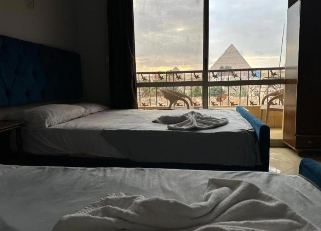 Pyramids Family Inn Kafret el-Gabal Kültér fotó